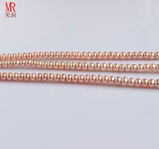 5-6mm Pink Freshwater Pearl Strand , Button Round (ES125)